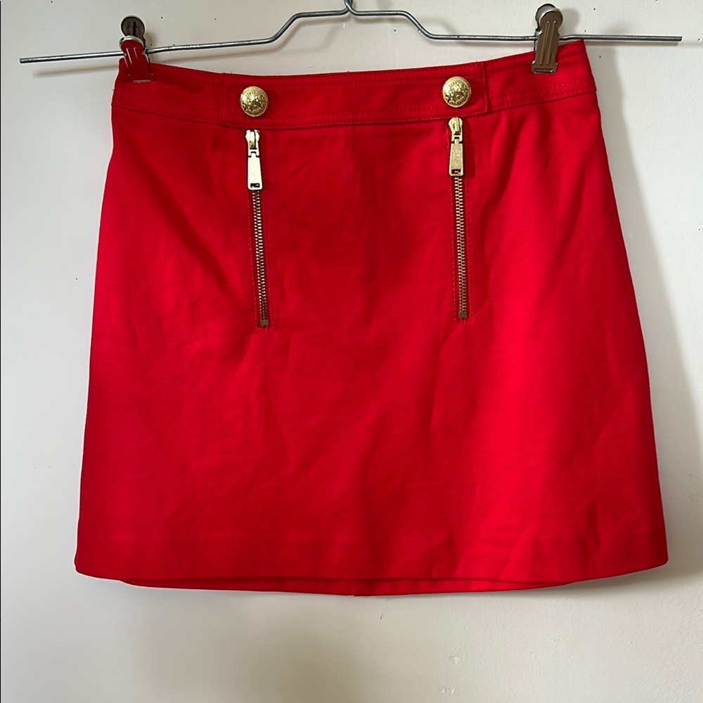 Express  fully lined, rayon red mini skirt with gold accents size 4 like new